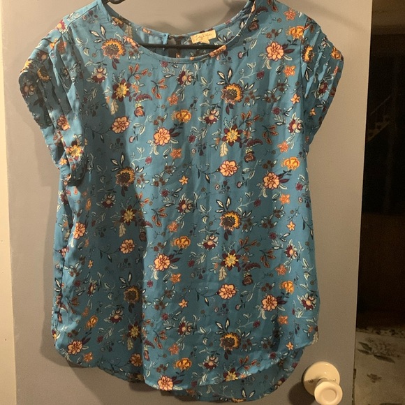 Lily White Tops - Lily White sleeveless top.